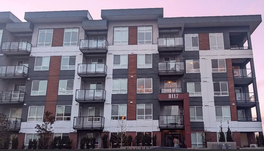 Front of the Eastin Condos building at 8117 200A St, Langley, at dusk